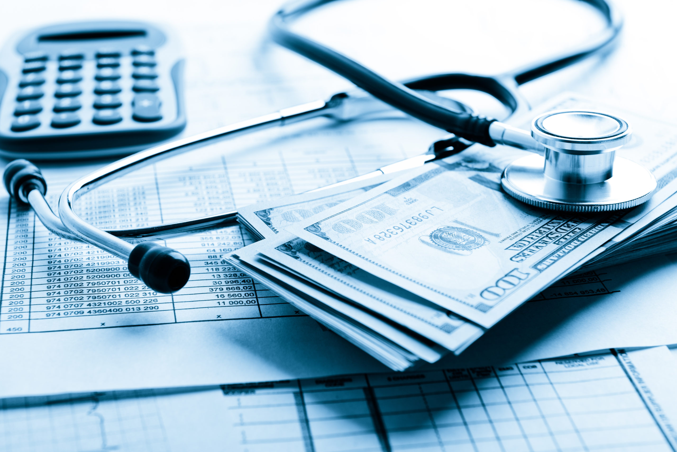 Health Insurance Application Form With Banknote And Stethoscope
