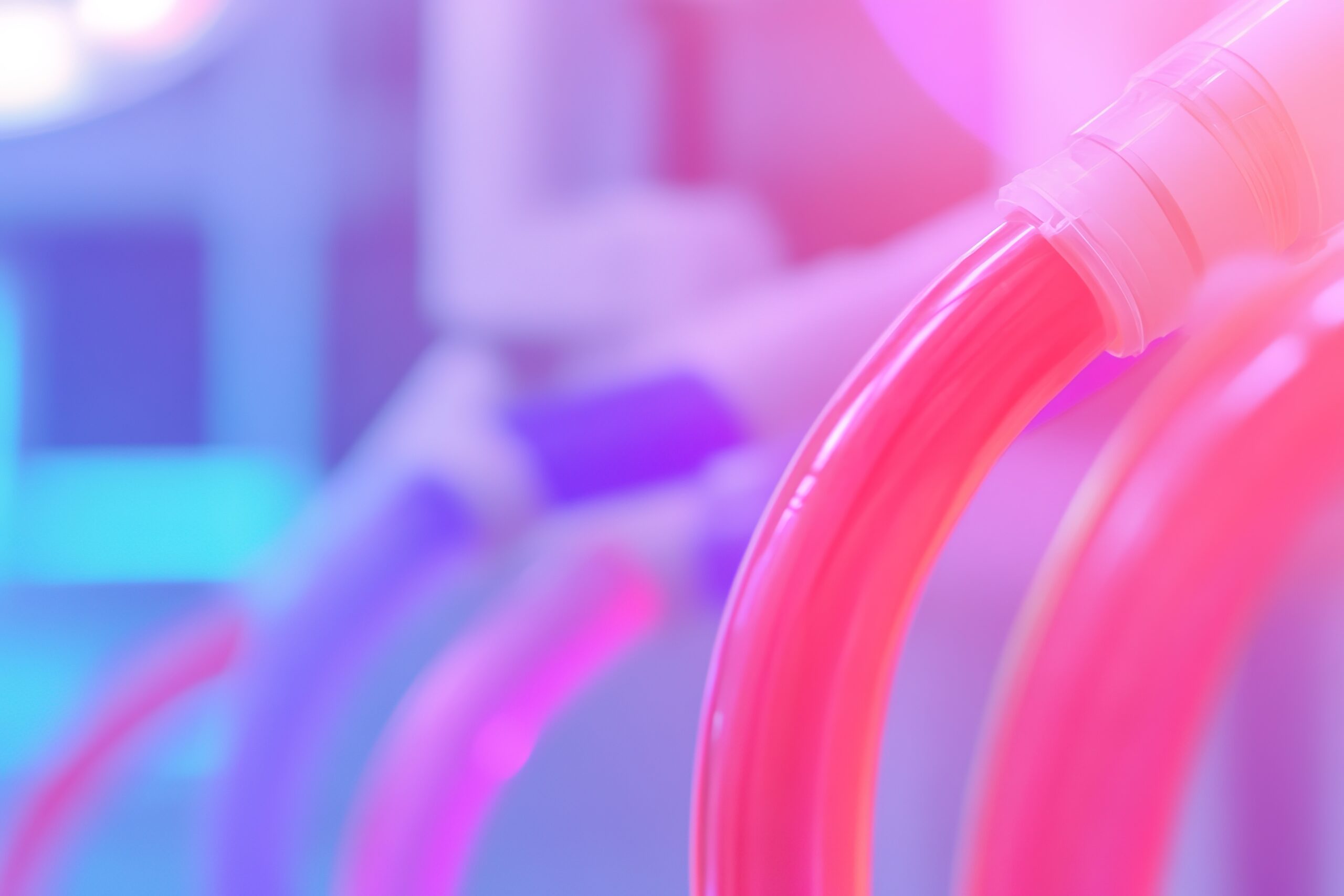 Close Up Of Vibrant Kidney Perfusion Machine In Action Sterile Tubing Glowing With Red And Blue Colors Under Soft Surgical